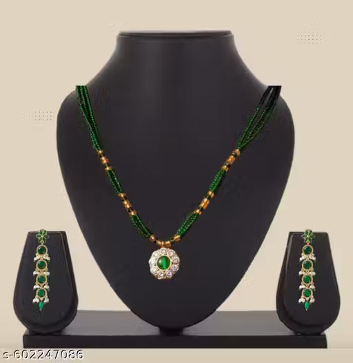 Elegant Green Emerald-Inspired Chandbali Jhumka Earrings with Pearl Tassel Drops and Matching Beaded Necklace Set